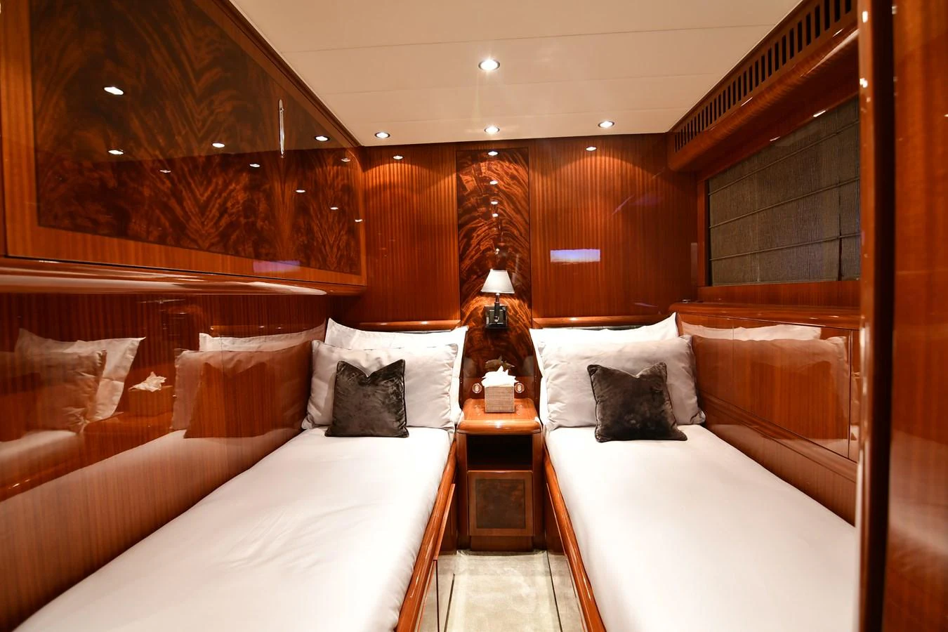 a room with two beds aboard OSE Yacht for Sale