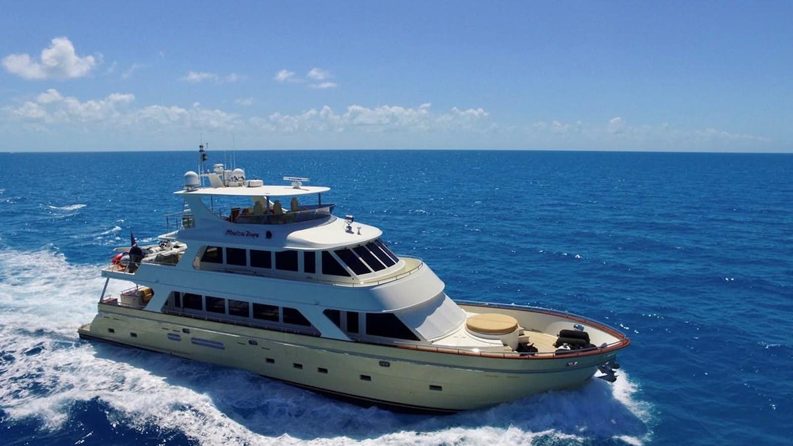 a boat on the water aboard MAGICAL DAYS Yacht for Sale