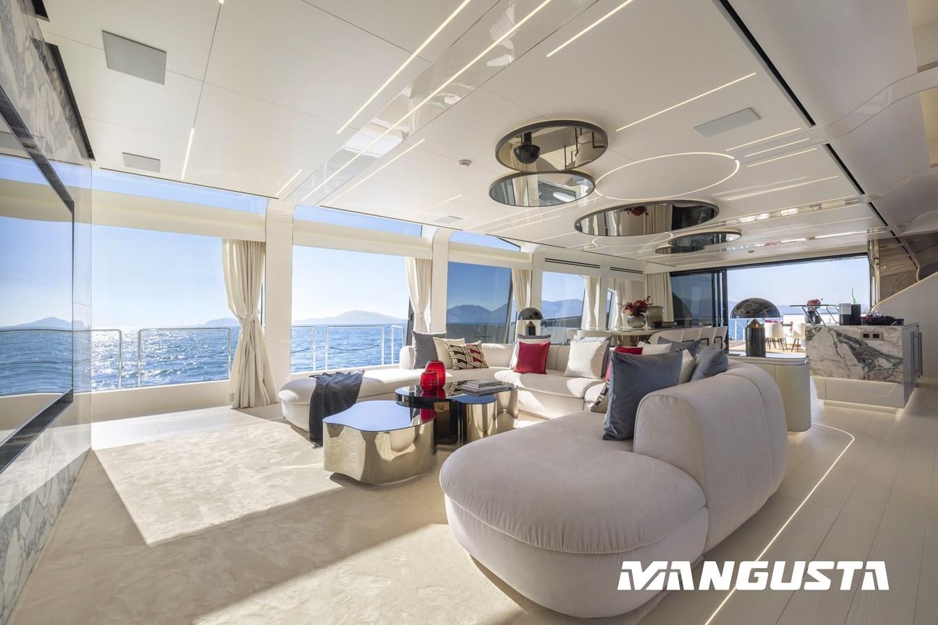 a room with a large window and a view of the ocean aboard NO RUSH Yacht for Sale