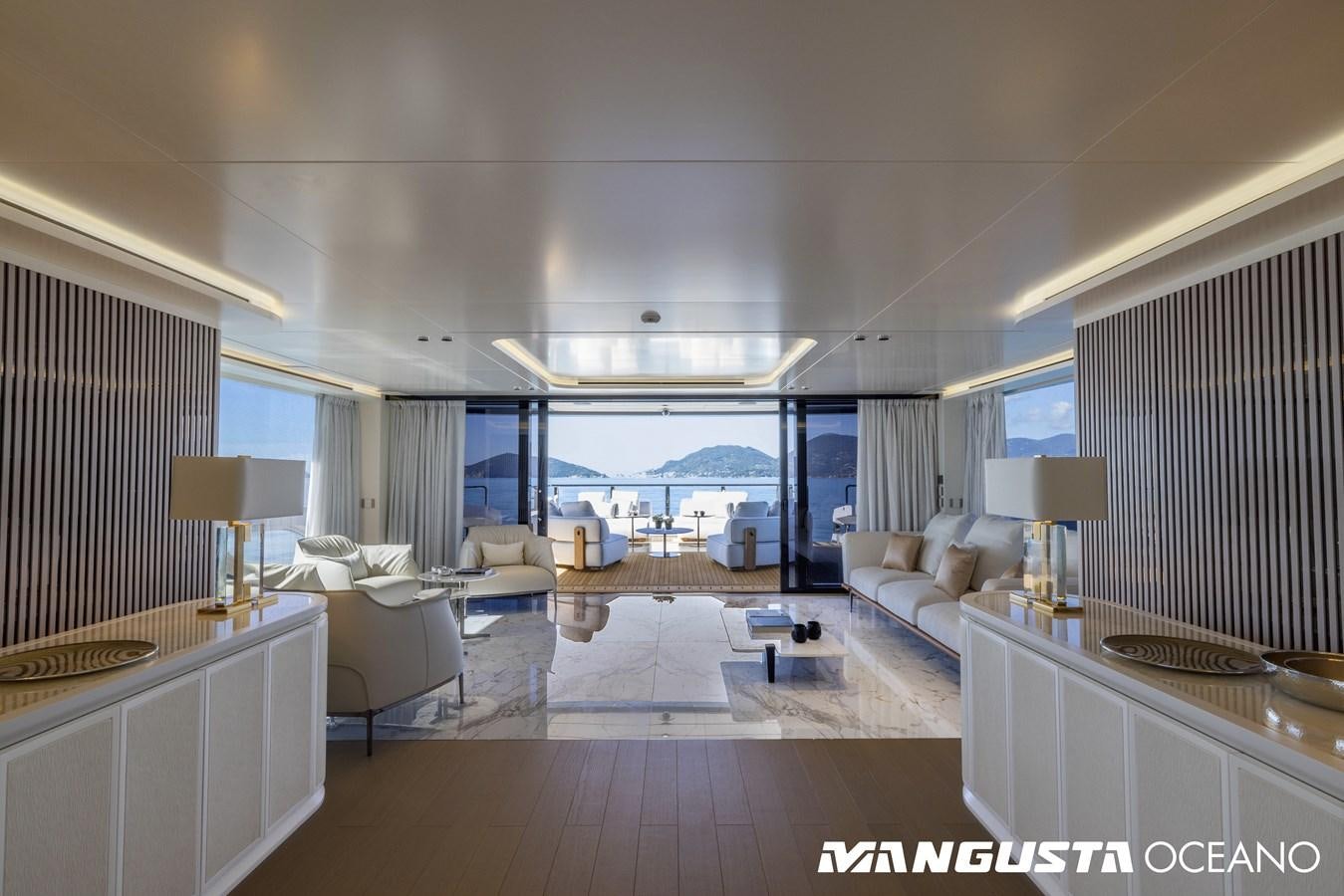 a large living room with a large balcony aboard EVA4EVA Yacht for Sale