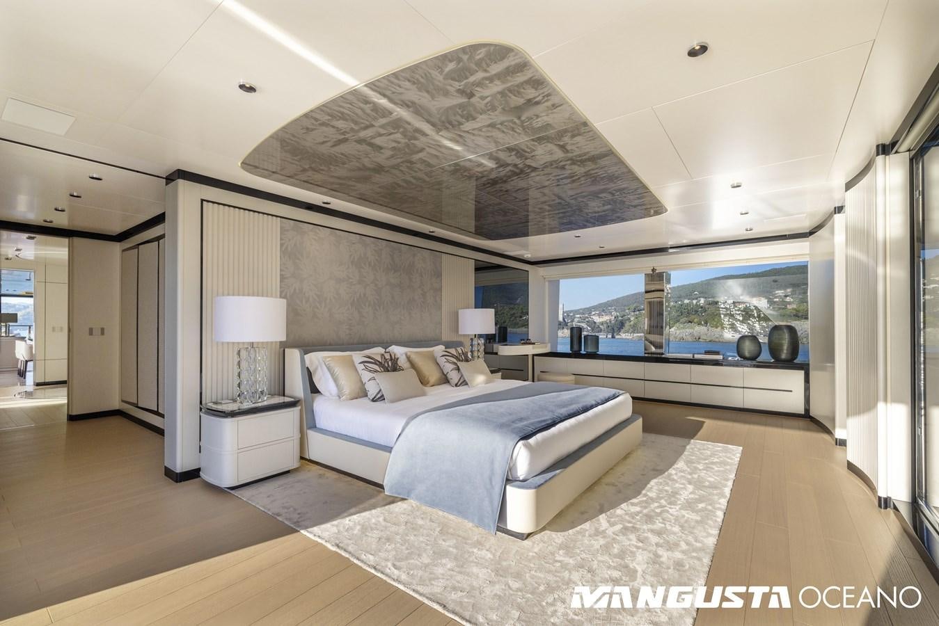 a large bedroom with a large bed aboard EVA4EVA Yacht for Sale