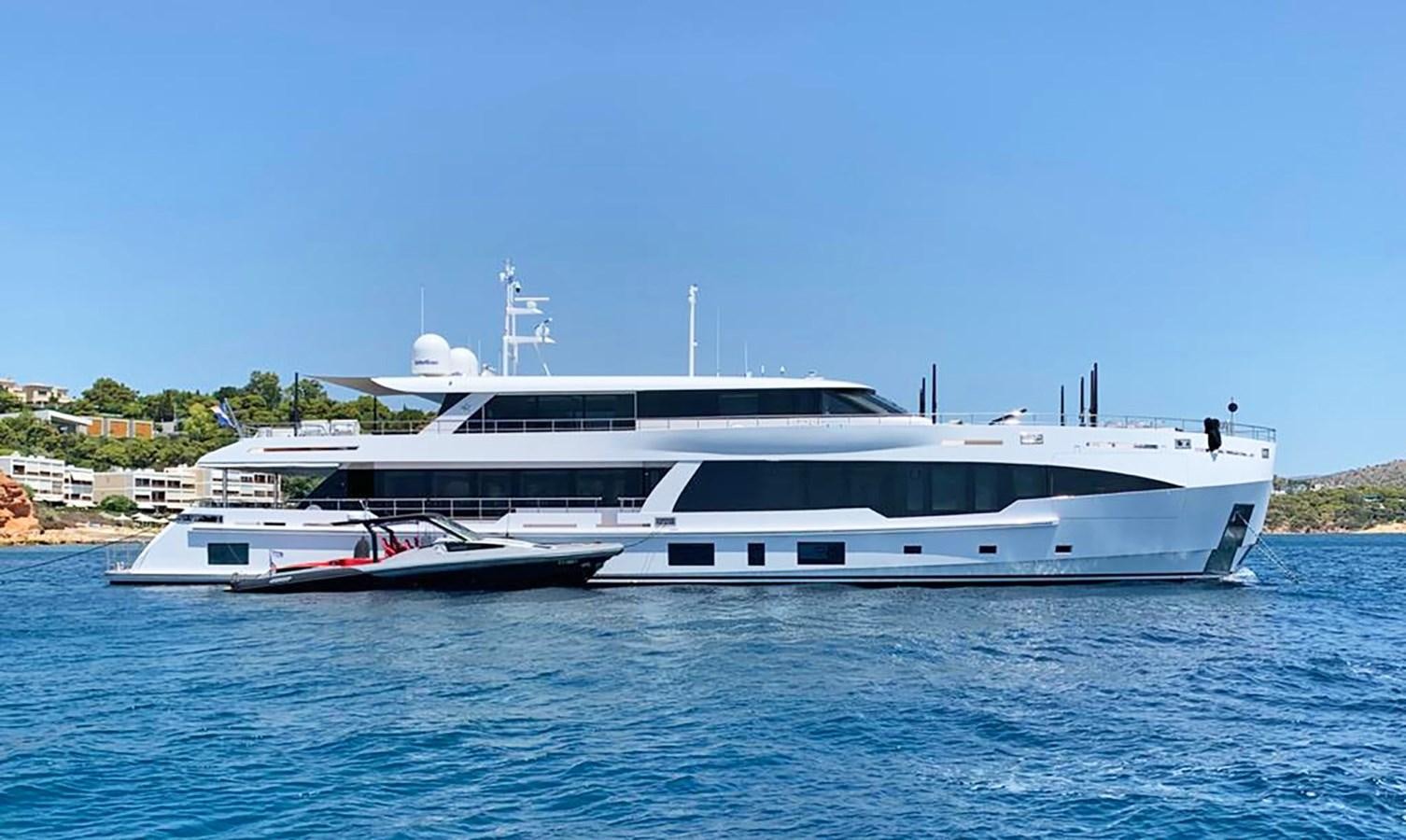 a large white boat in the water aboard M55 Yacht for Sale