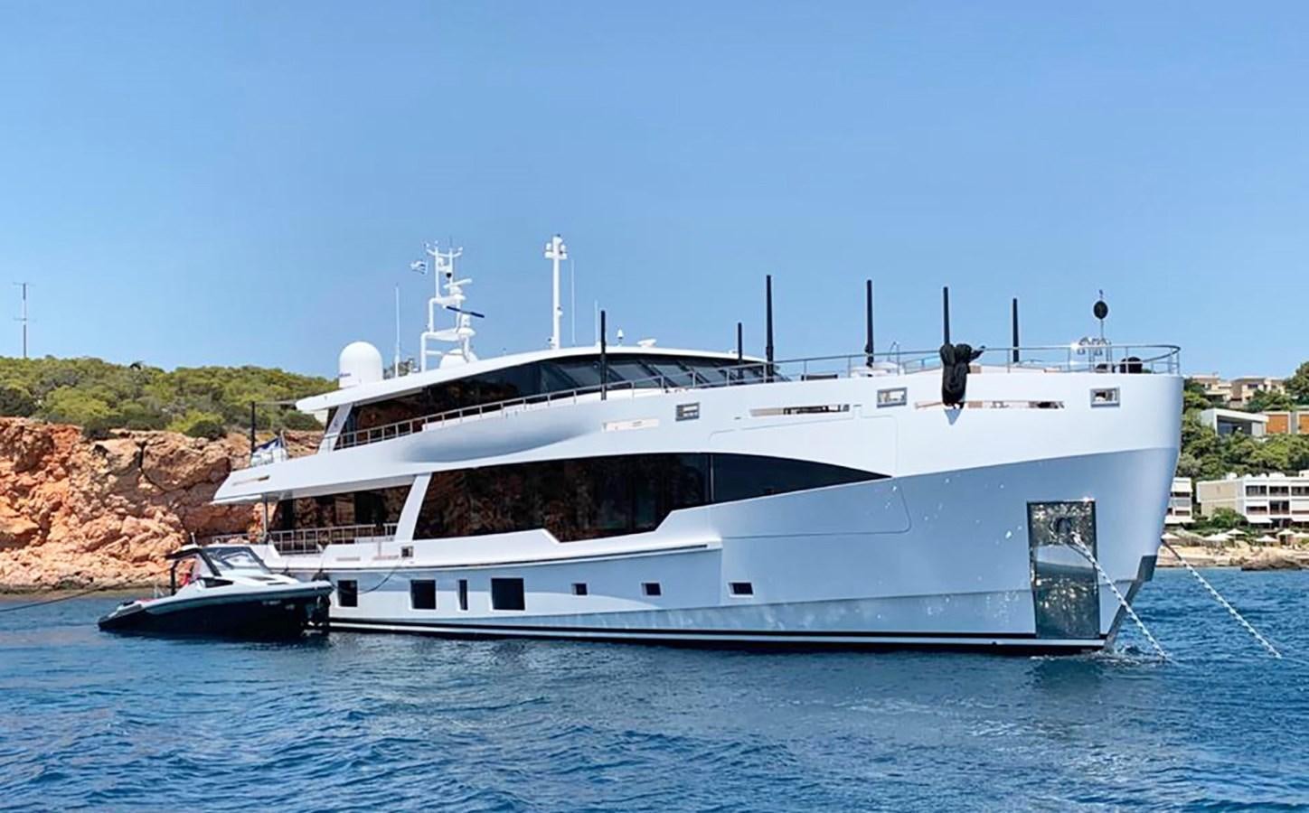 a white yacht in the water aboard M55 Yacht for Sale