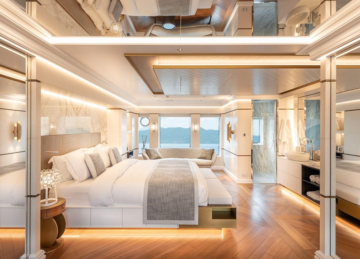 a room with a bed and a window aboard M55 Yacht for Sale