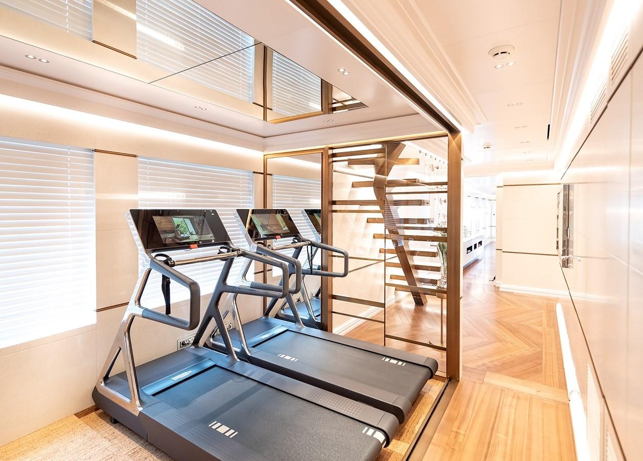 a room with bunk beds aboard M55 Yacht for Sale