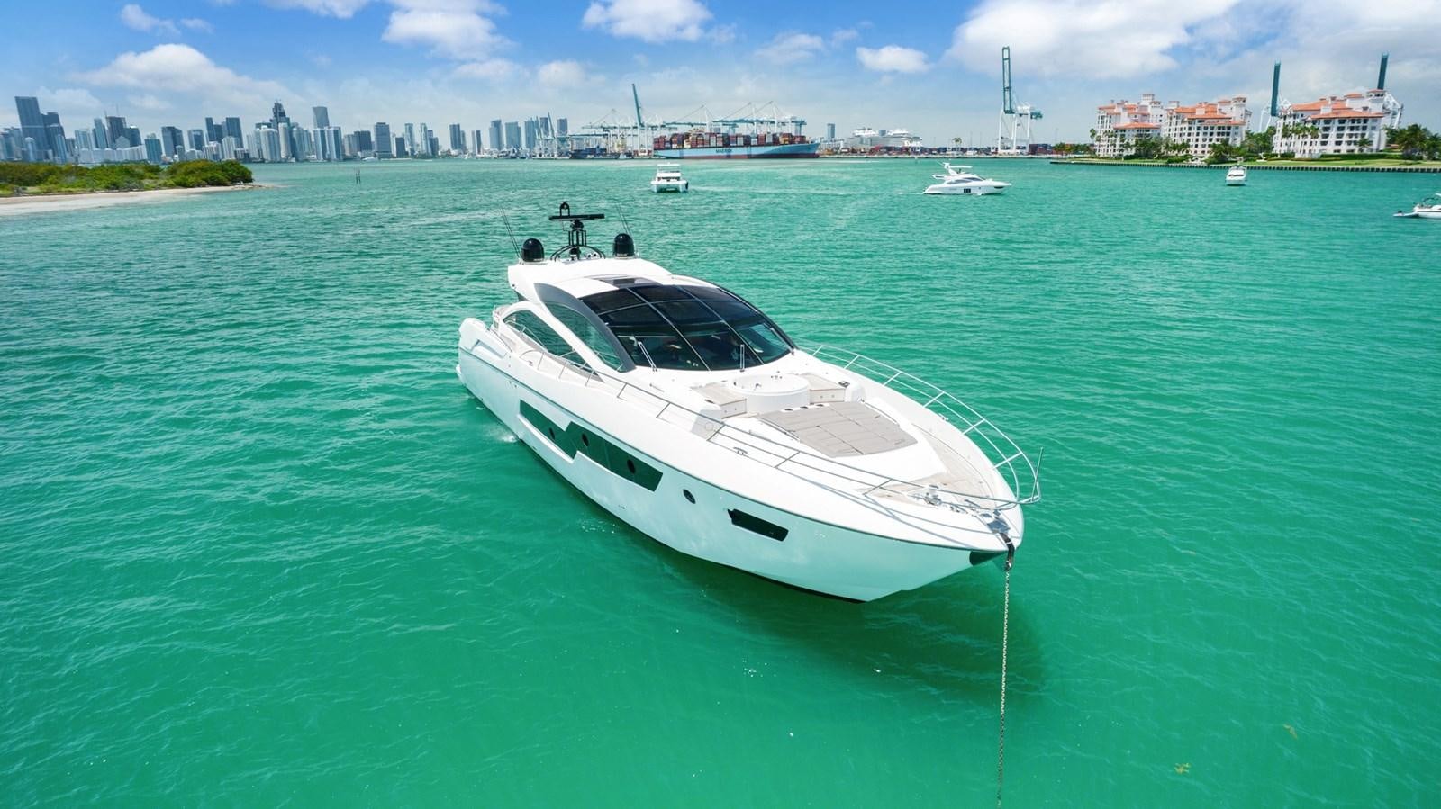 a white yacht in the water aboard WOODEVER Yacht for Sale