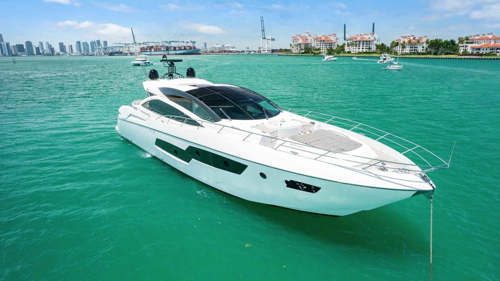 a white yacht in the water aboard WOODEVER Yacht for Sale