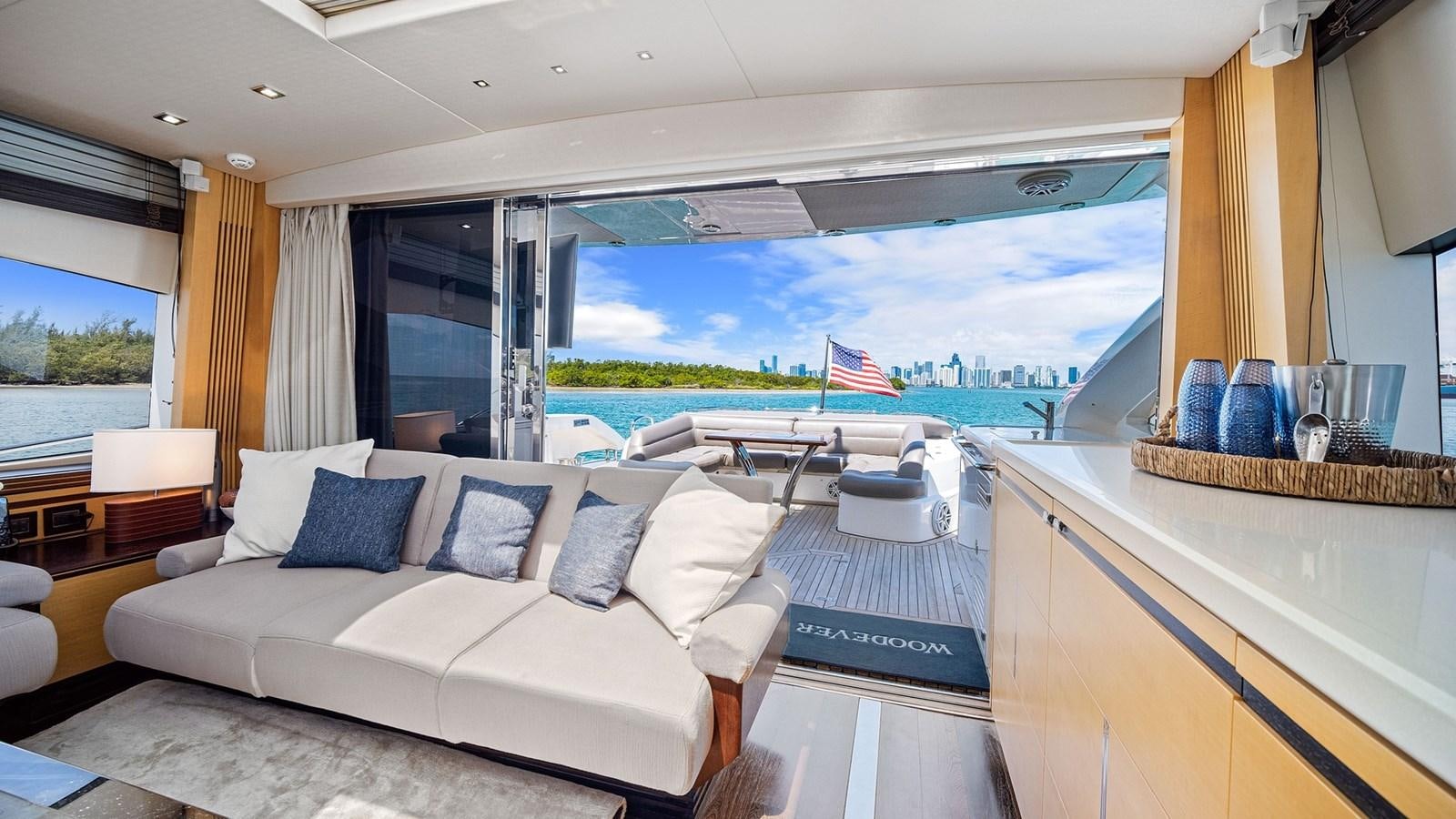 a large room with a large window aboard WOODEVER Yacht for Sale