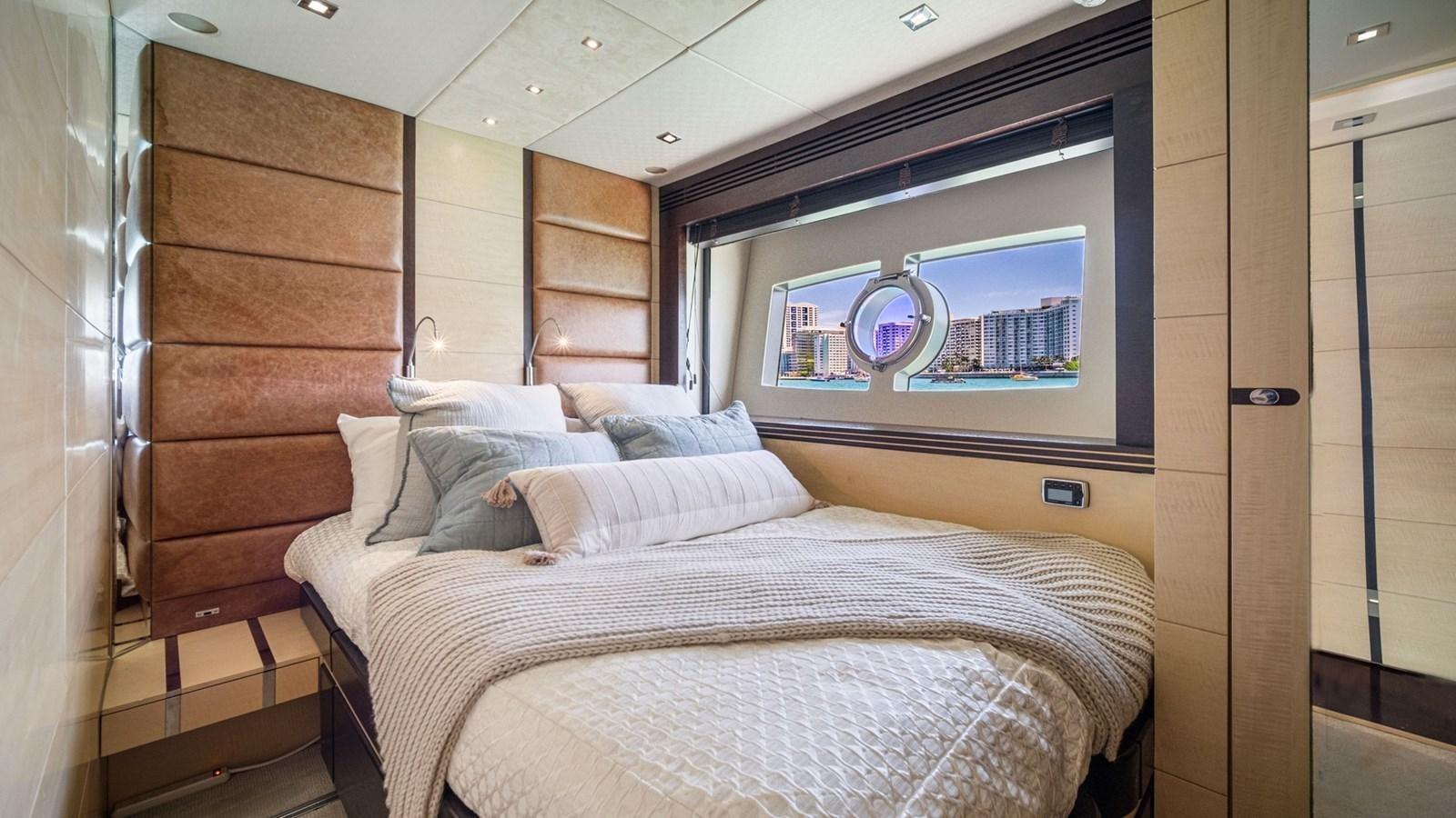a bed in a room aboard WOODEVER Yacht for Sale