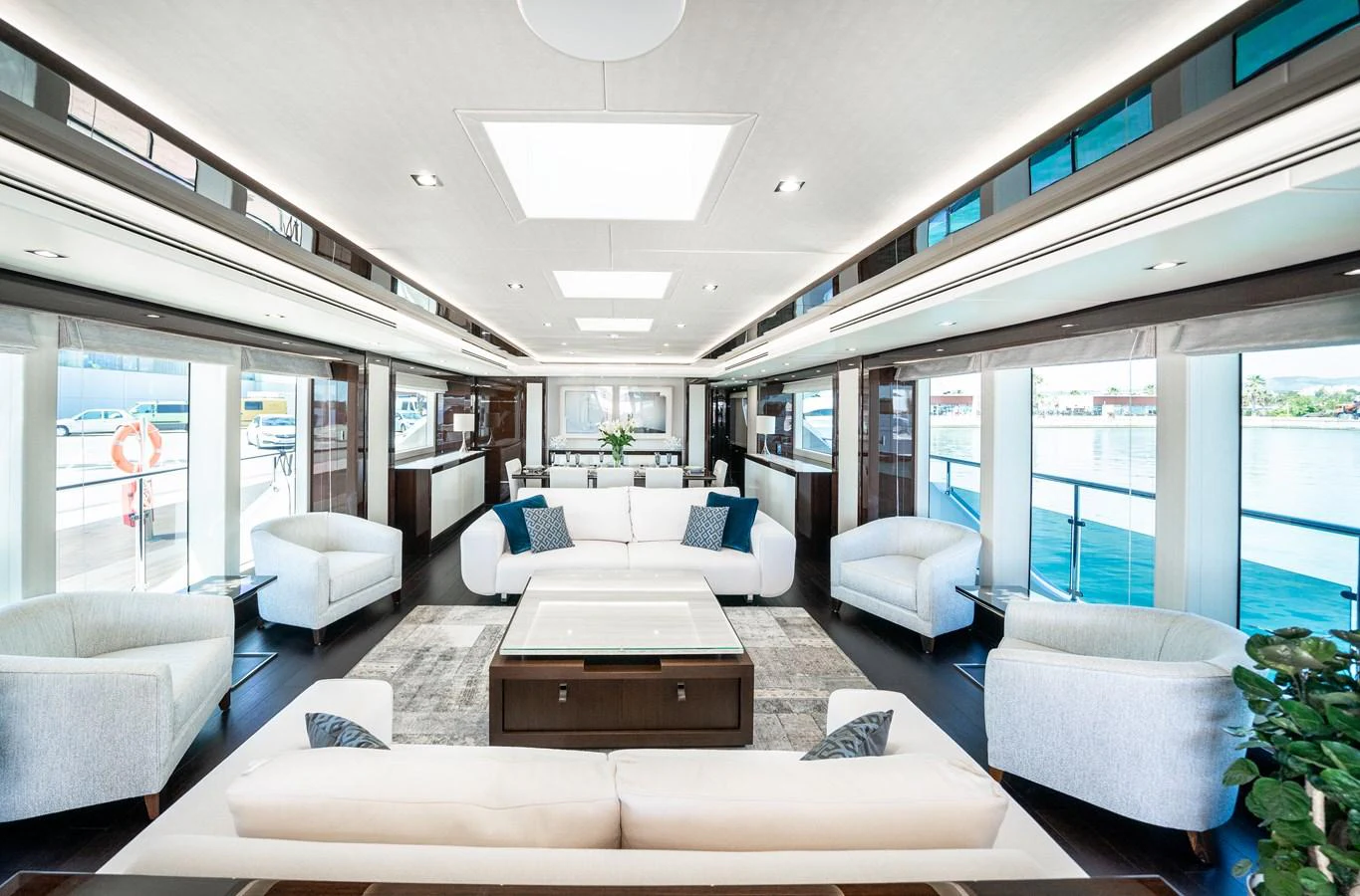 a living room with a large window aboard SUNSEEKER 116 -  QART HADASHT Yacht for Sale