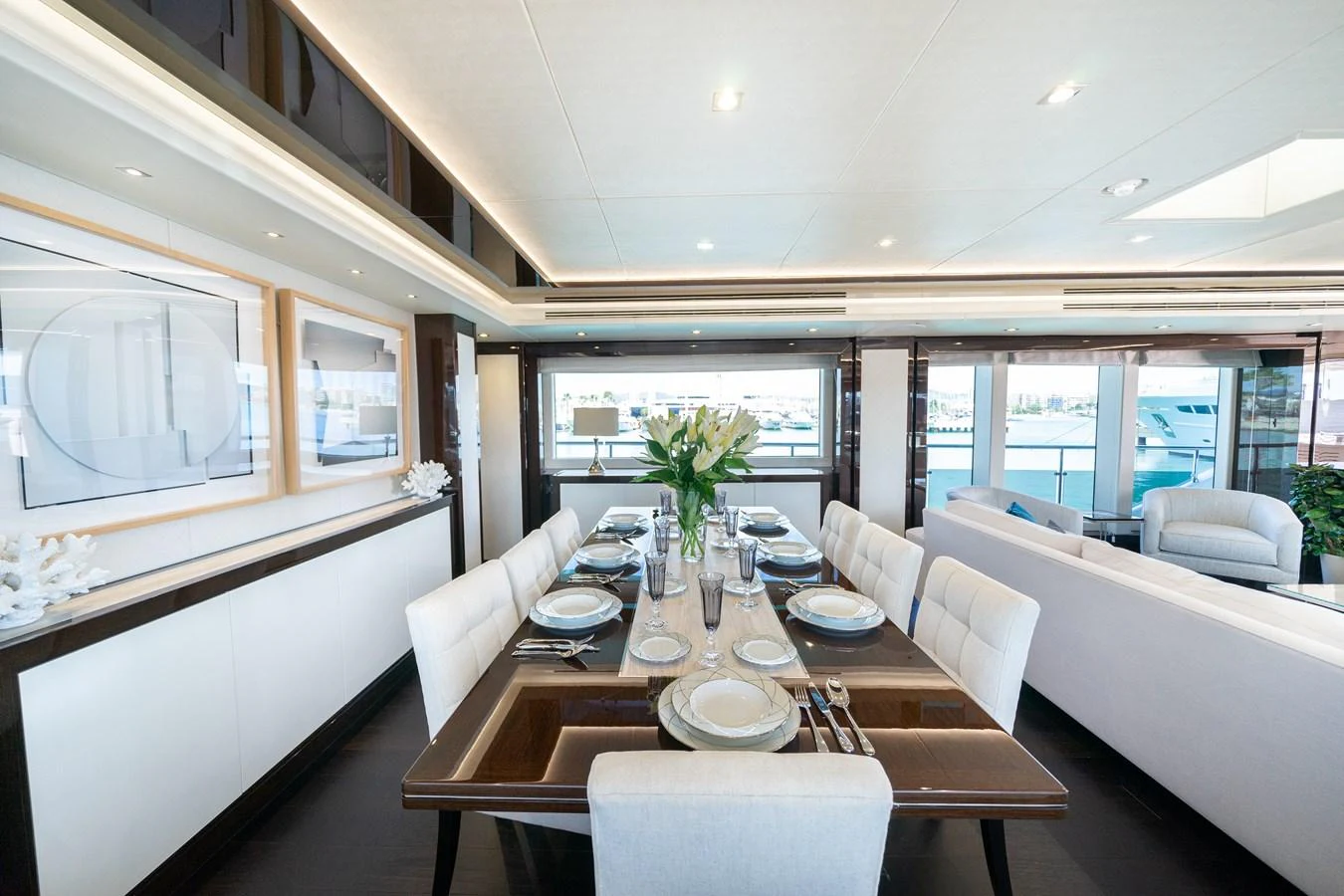 a dining room with a table and chairs aboard SUNSEEKER 116 -  QART HADASHT Yacht for Sale