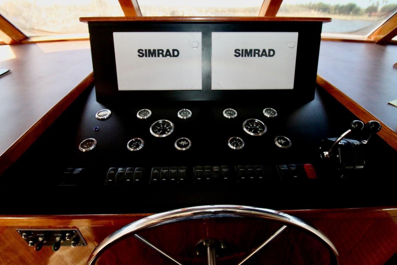 a black electronic device with a screen aboard ROYAL EAGLE II Yacht for Sale