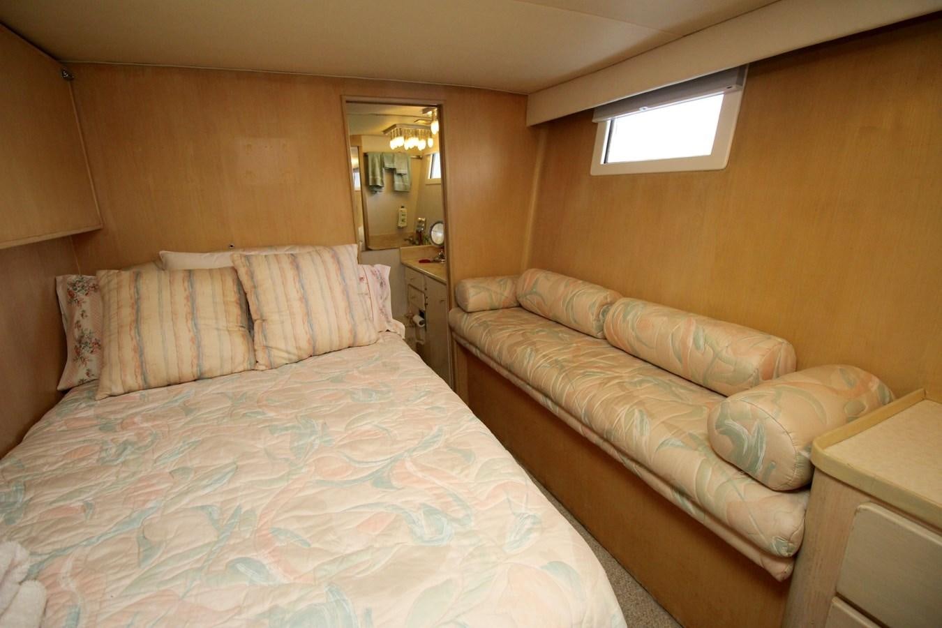a couple of beds in a room aboard ROYAL EAGLE II Yacht for Sale