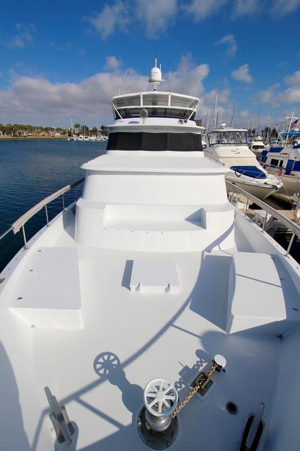 a white boat with a rope attached to it aboard ROYAL EAGLE II Yacht for Sale