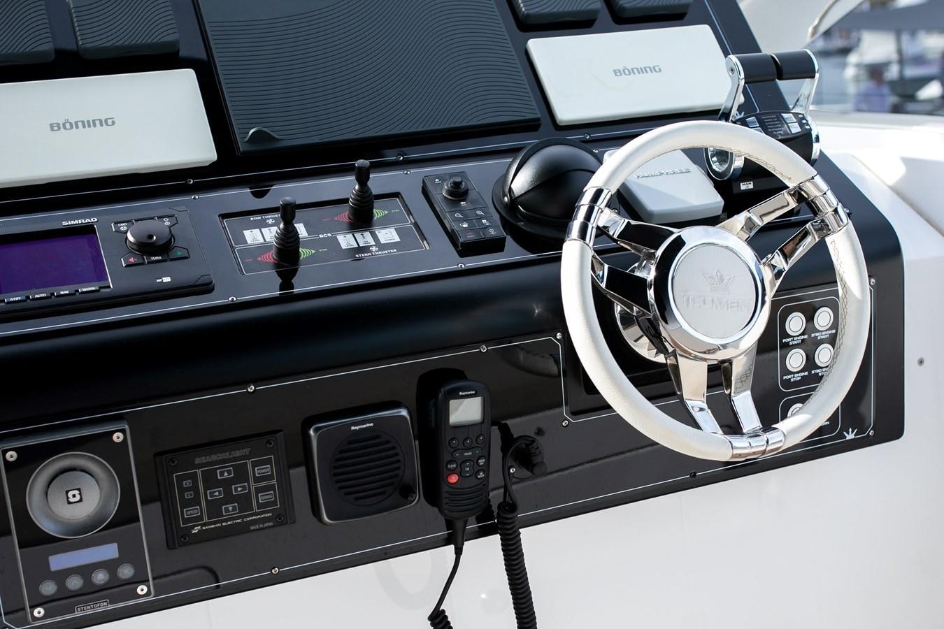 a car with a steering wheel aboard YORAL Yacht for Sale