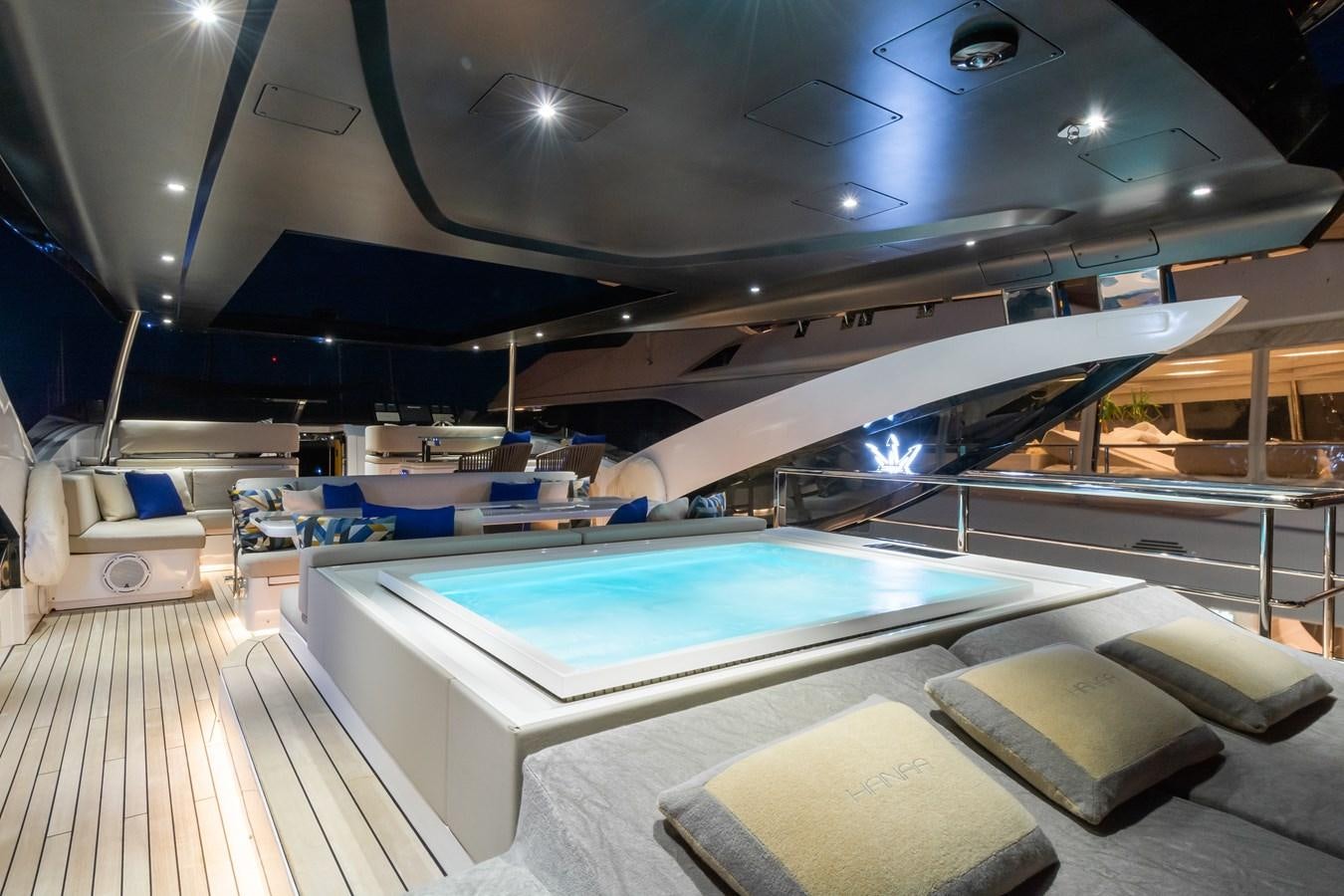 a room with a large pool aboard YORAL Yacht for Sale