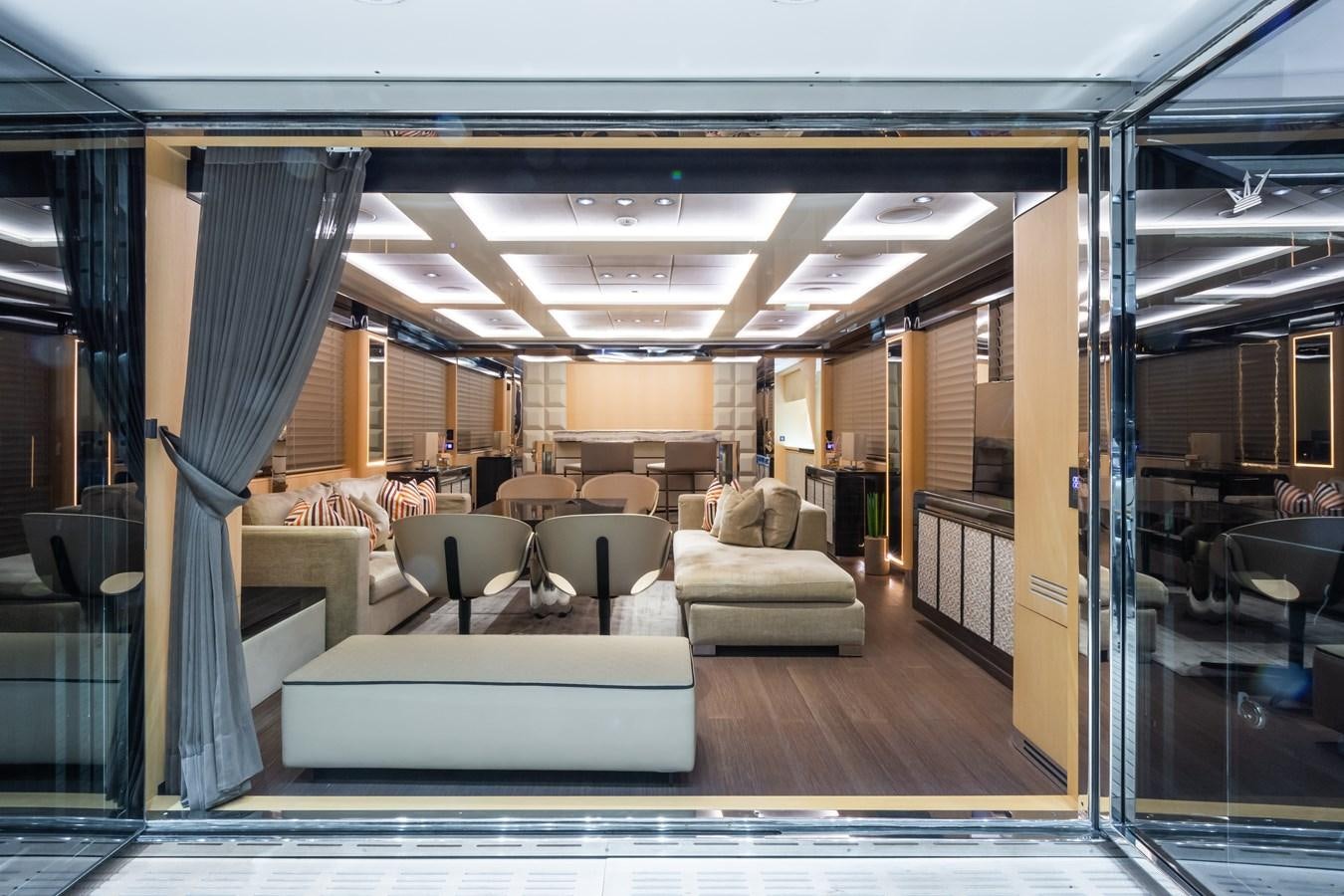 a room with a couch and a table aboard YORAL Yacht for Sale