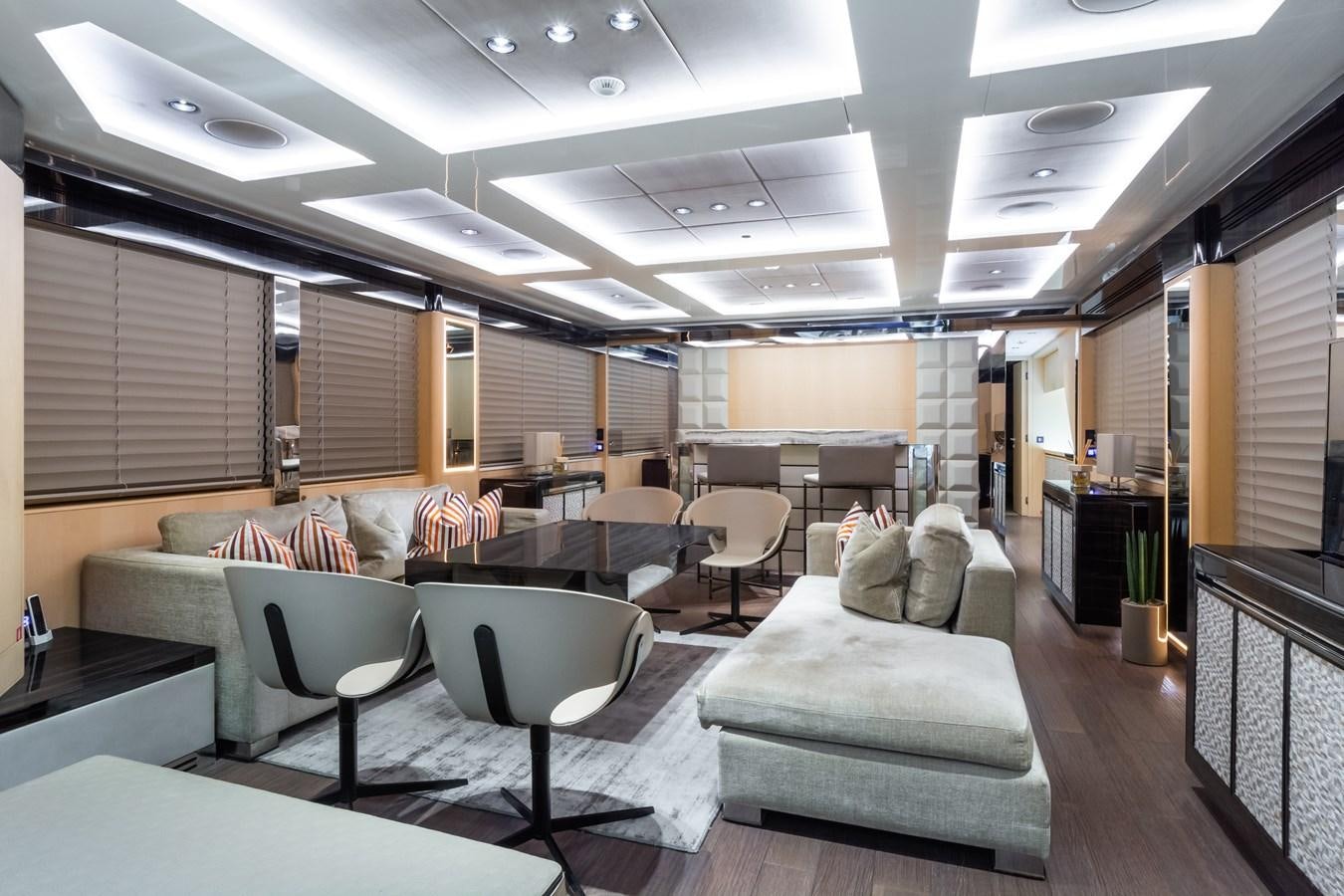 a room with a couch and chairs aboard YORAL Yacht for Sale