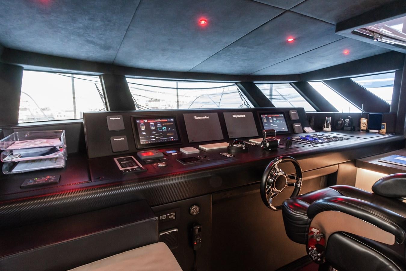 inside of a vehicle with many screens aboard YORAL Yacht for Sale