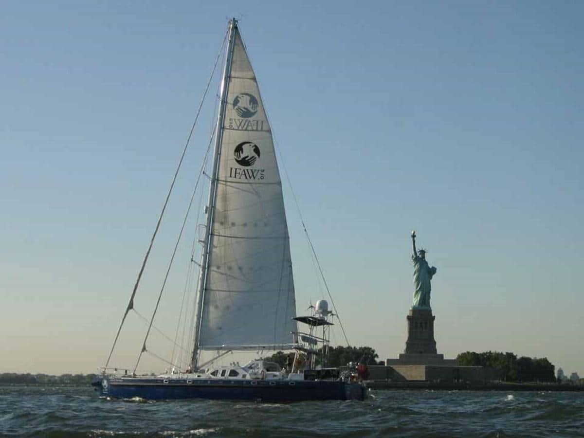 a sailboat in the water aboard SONG OF THE WHALE Yacht for Sale