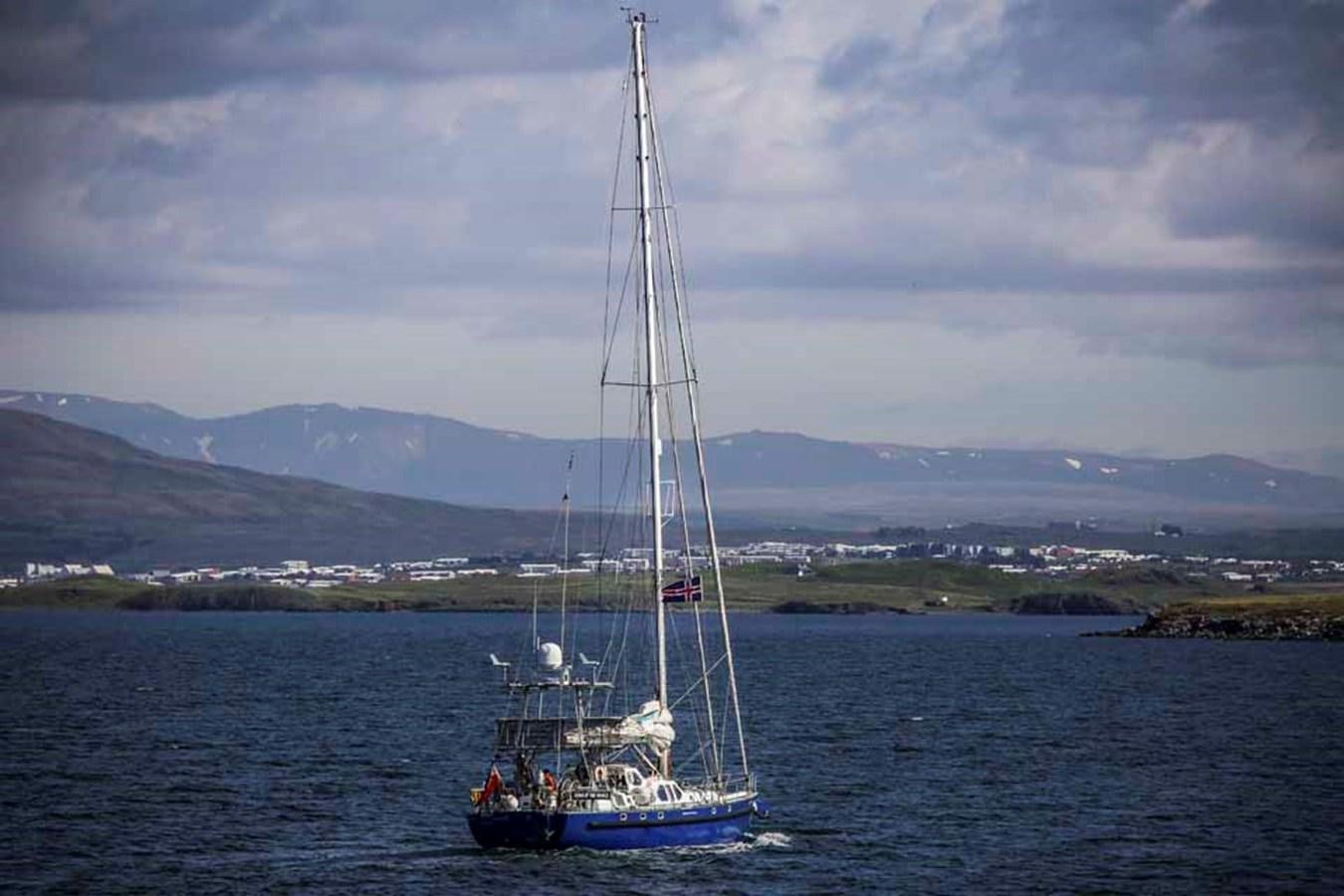 a sailboat on the water aboard SONG OF THE WHALE Yacht for Sale