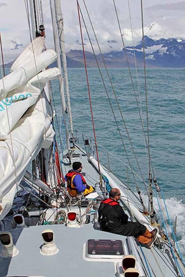 a group of people on a sailboat aboard SONG OF THE WHALE Yacht for Sale
