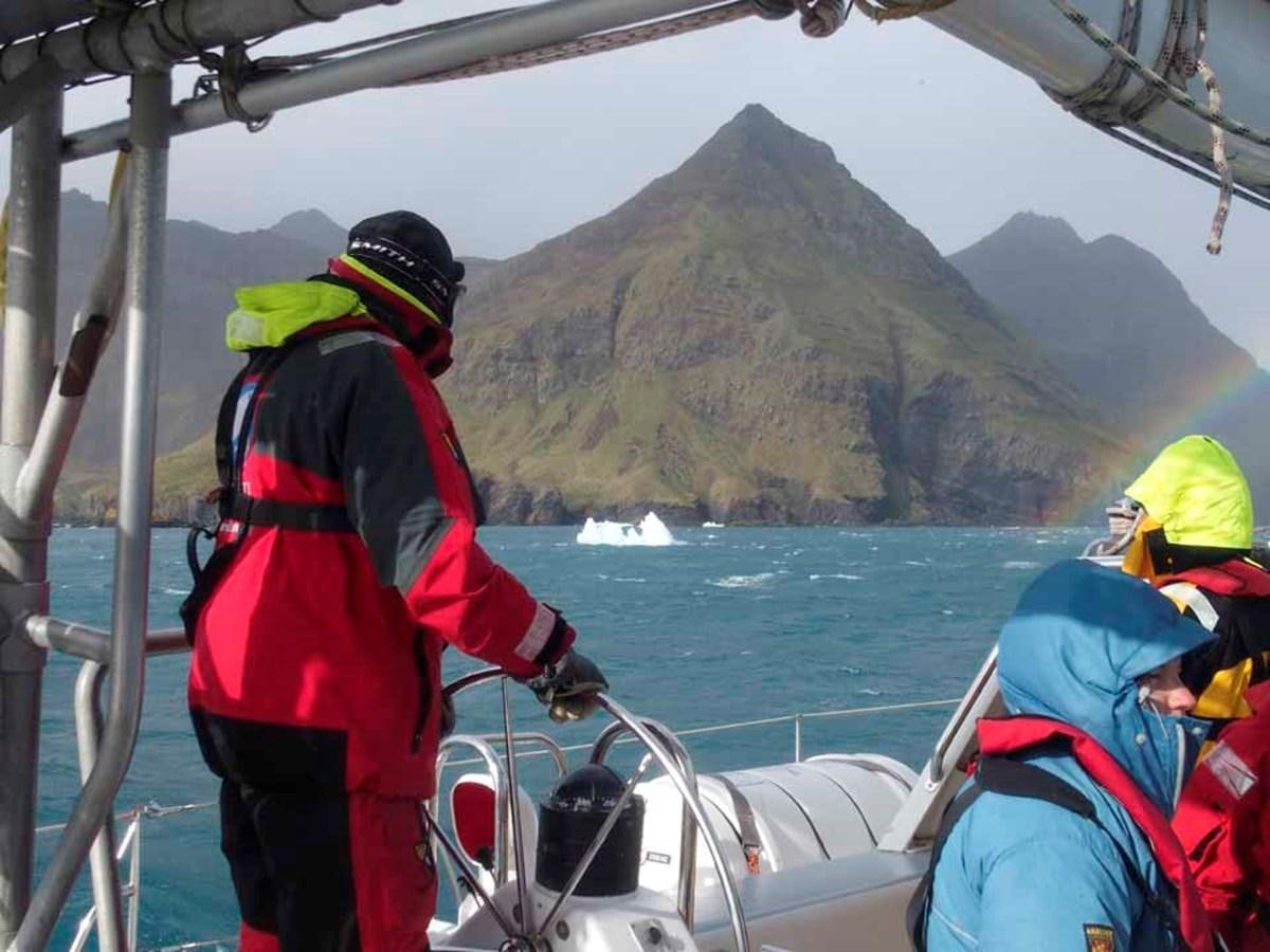 a group of people on a boat aboard SONG OF THE WHALE Yacht for Sale
