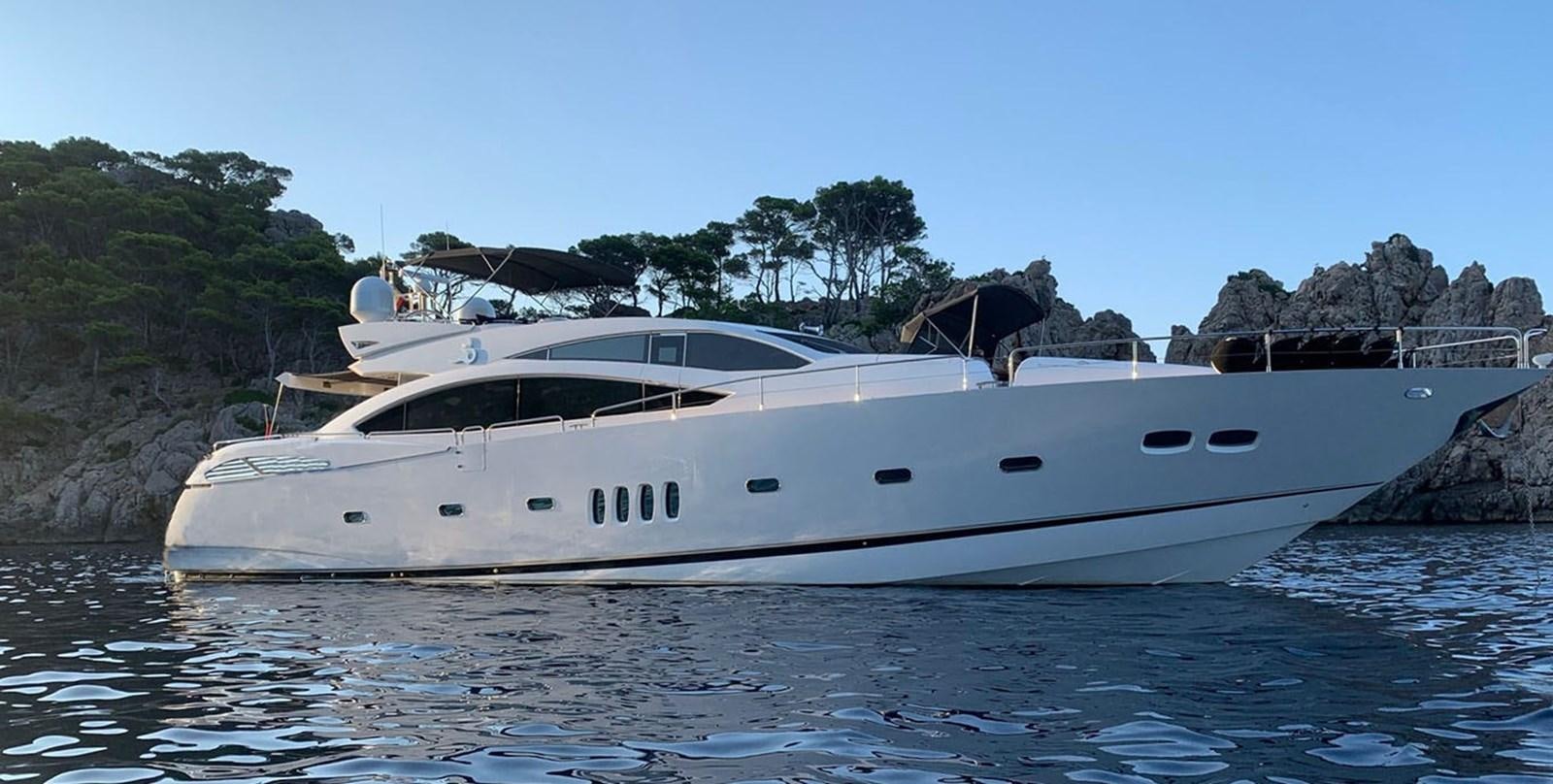 a white yacht in the water aboard JAX OF IBIZA Yacht for Sale