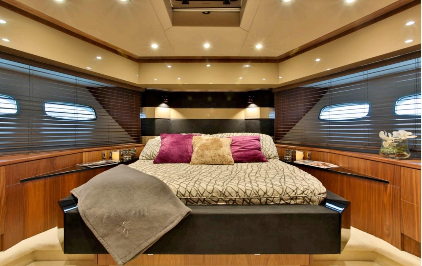 a bed in a room aboard JAX OF IBIZA Yacht for Sale