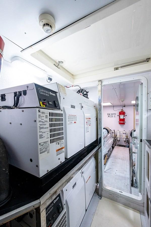 a room with machines and equipment aboard FERRETTI Yacht for Sale