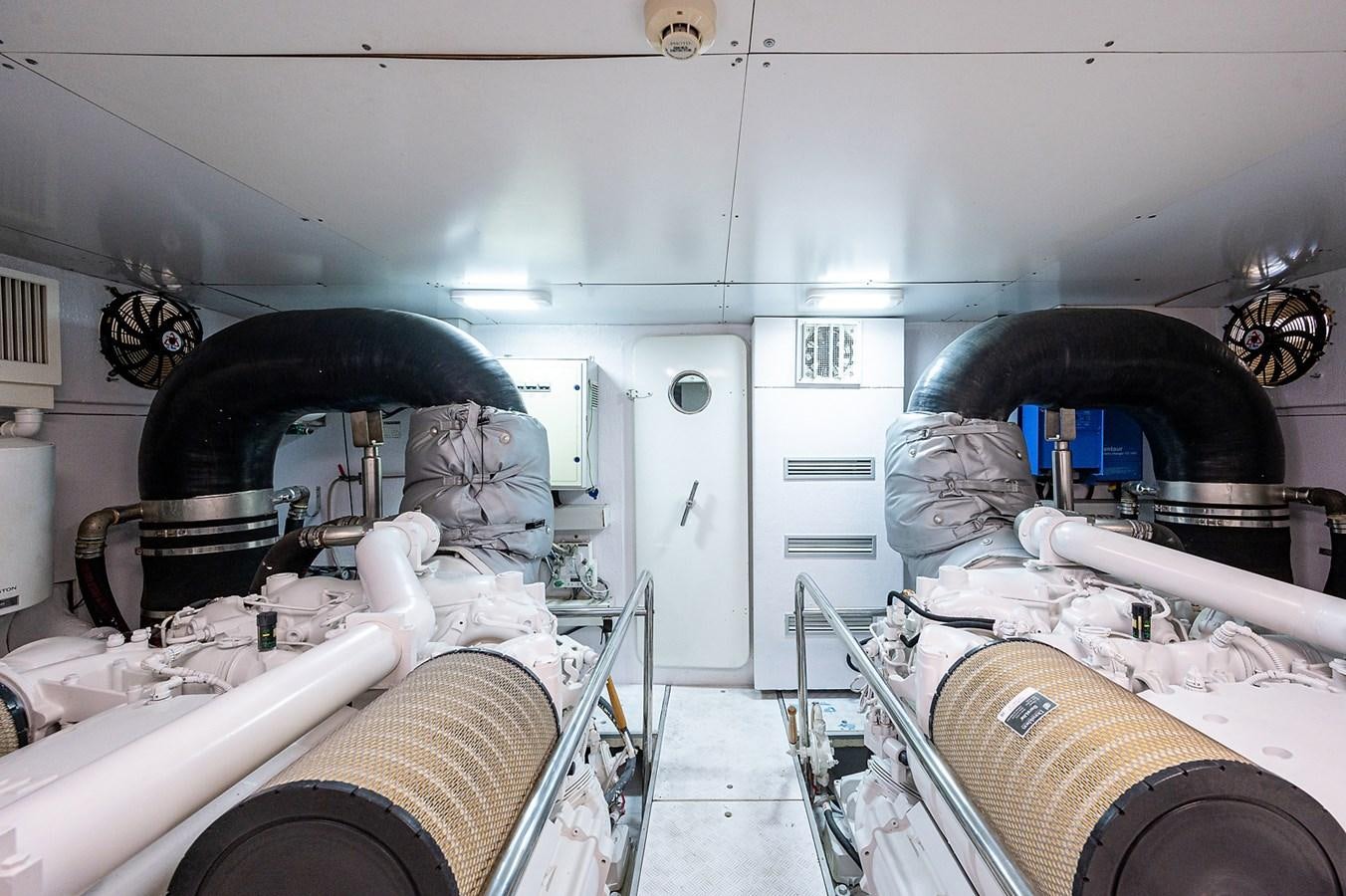 a room with a large machine aboard FERRETTI Yacht for Sale
