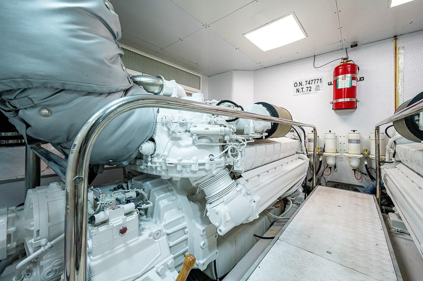 a large machine in a room aboard FERRETTI Yacht for Sale