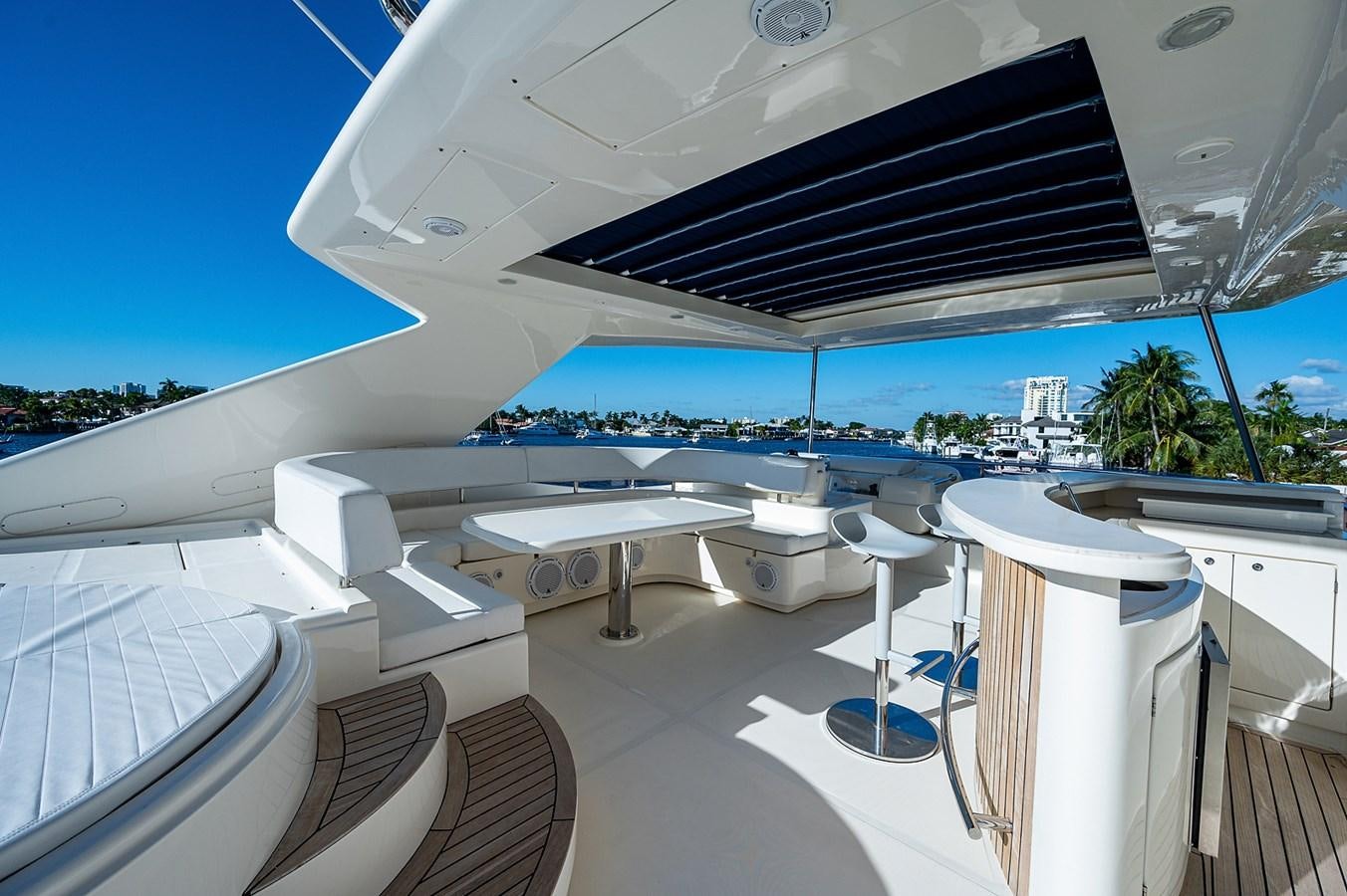 a white building with a solar panel aboard FERRETTI Yacht for Sale