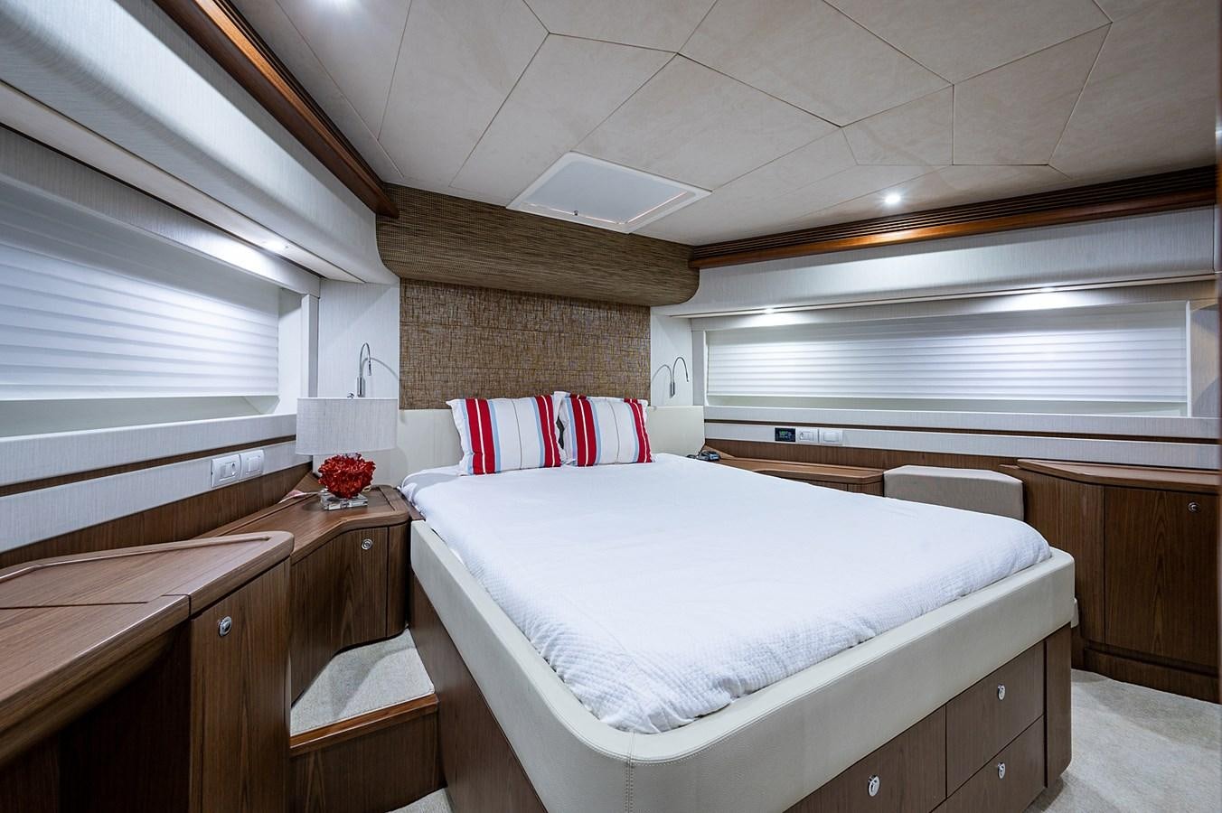 a room with two beds aboard FERRETTI Yacht for Sale