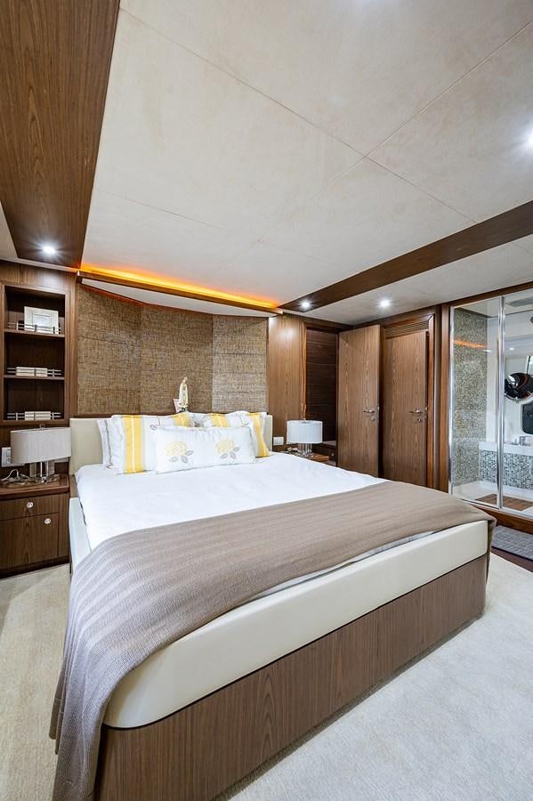 a bed in a room aboard FERRETTI Yacht for Sale