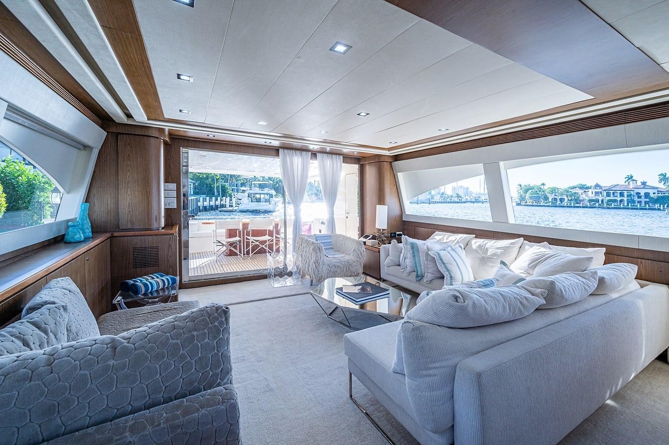 a bedroom with a large bed aboard FERRETTI Yacht for Sale