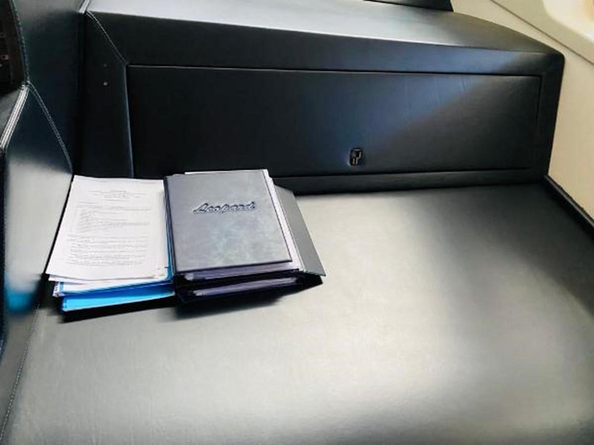a book on a desk aboard 2008 ARNO LEOPARD Yacht for Sale