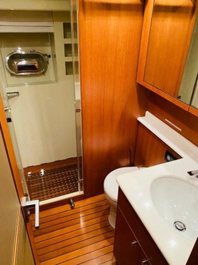 a bathroom with a sink and a toilet aboard 2008 ARNO LEOPARD Yacht for Sale