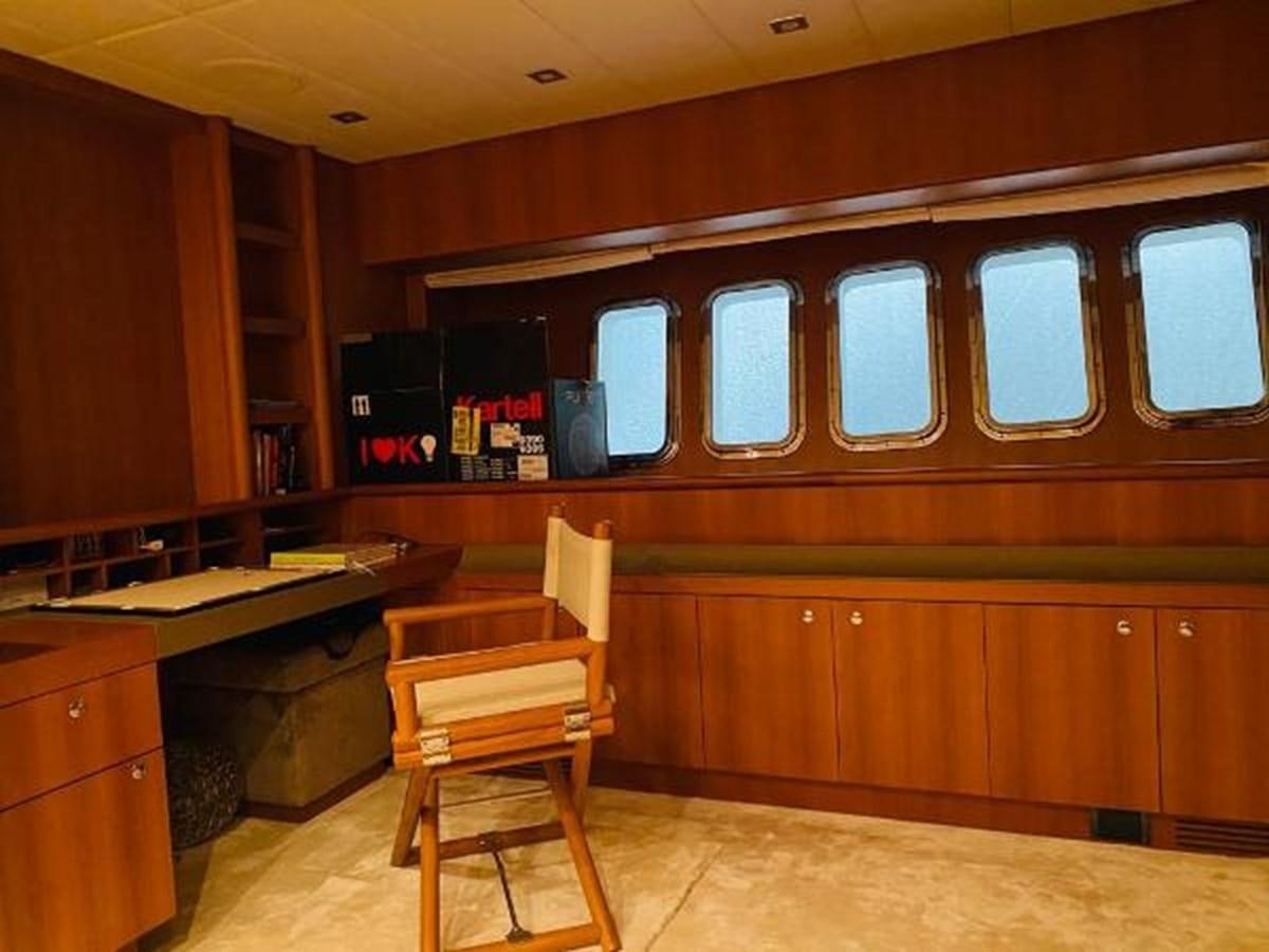 a wooden chair in a room aboard 2008 ARNO LEOPARD Yacht for Sale