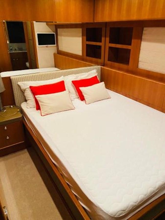a bed with pillows on it aboard 2008 ARNO LEOPARD Yacht for Sale
