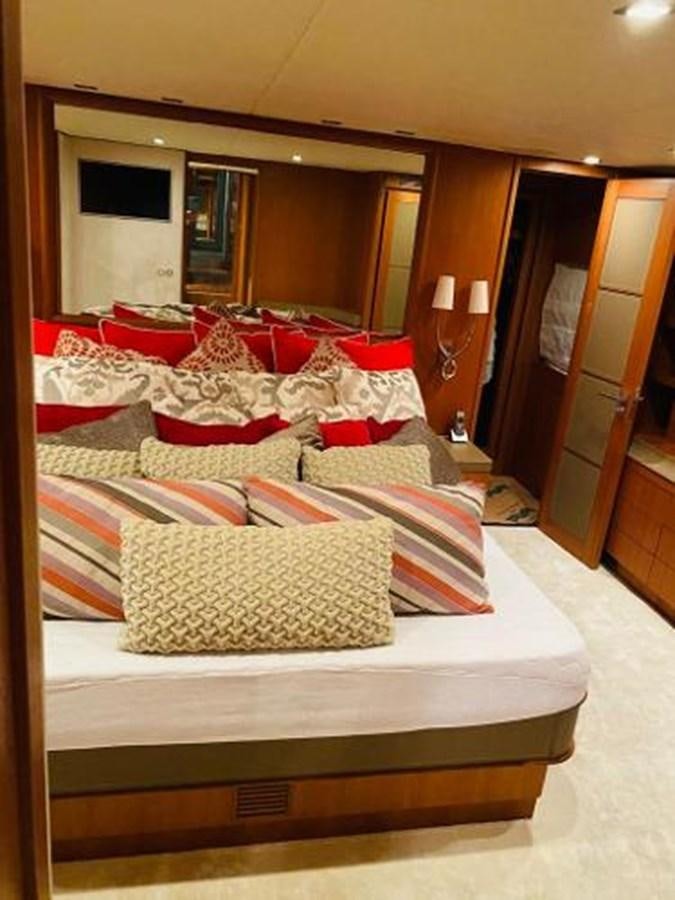 a bed with many pillows aboard 2008 ARNO LEOPARD Yacht for Sale