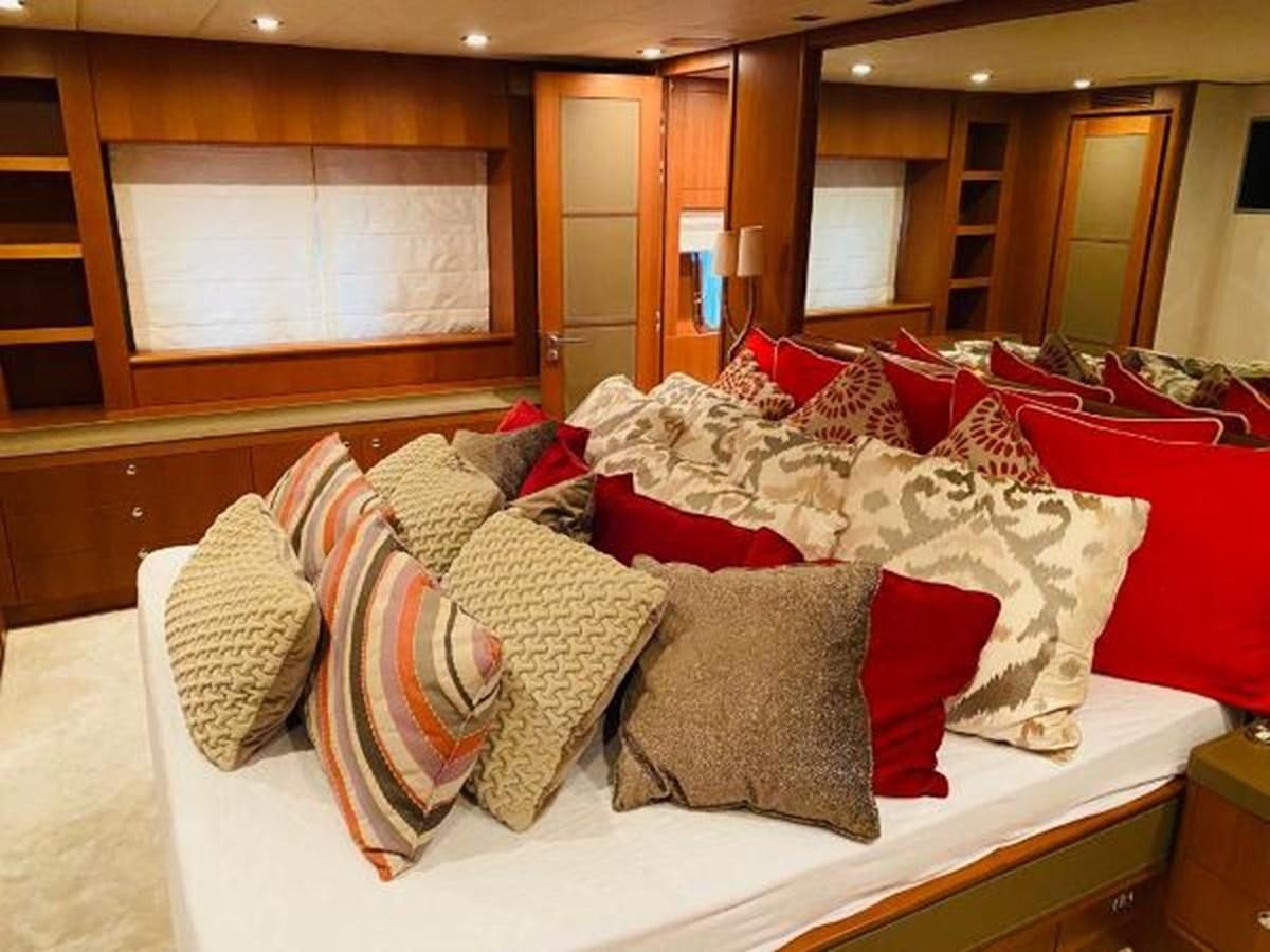a bed with pillows aboard 2008 ARNO LEOPARD Yacht for Sale