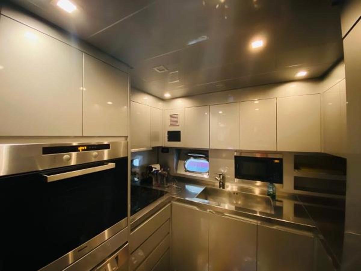 a kitchen with a microwave oven and a microwave aboard 2008 ARNO LEOPARD Yacht for Sale