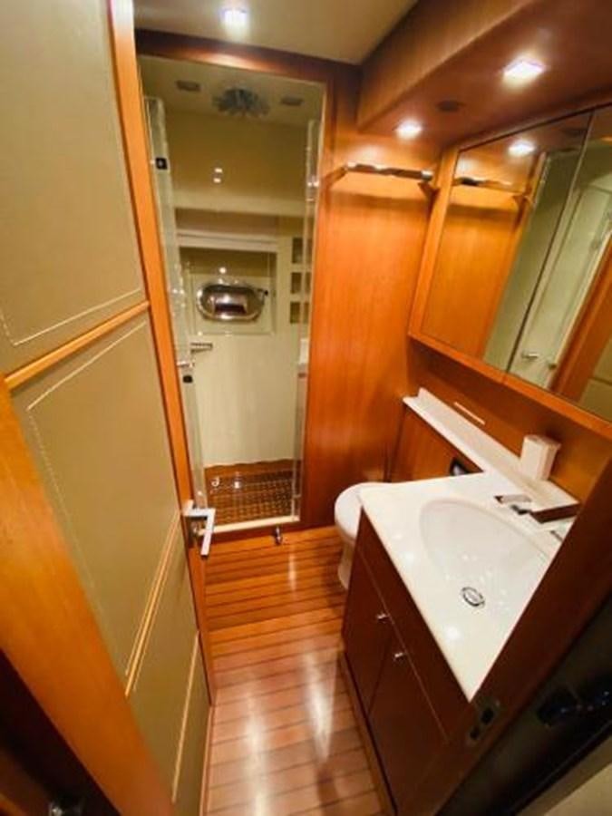 a bathroom with a sink and a mirror aboard 2008 ARNO LEOPARD Yacht for Sale