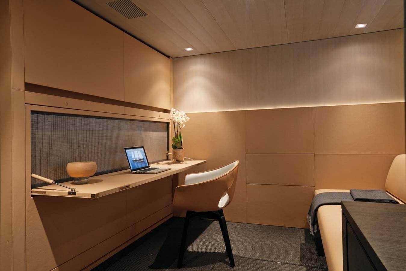 a room with a desk and a laptop aboard ENTERPRISE Yacht for Sale