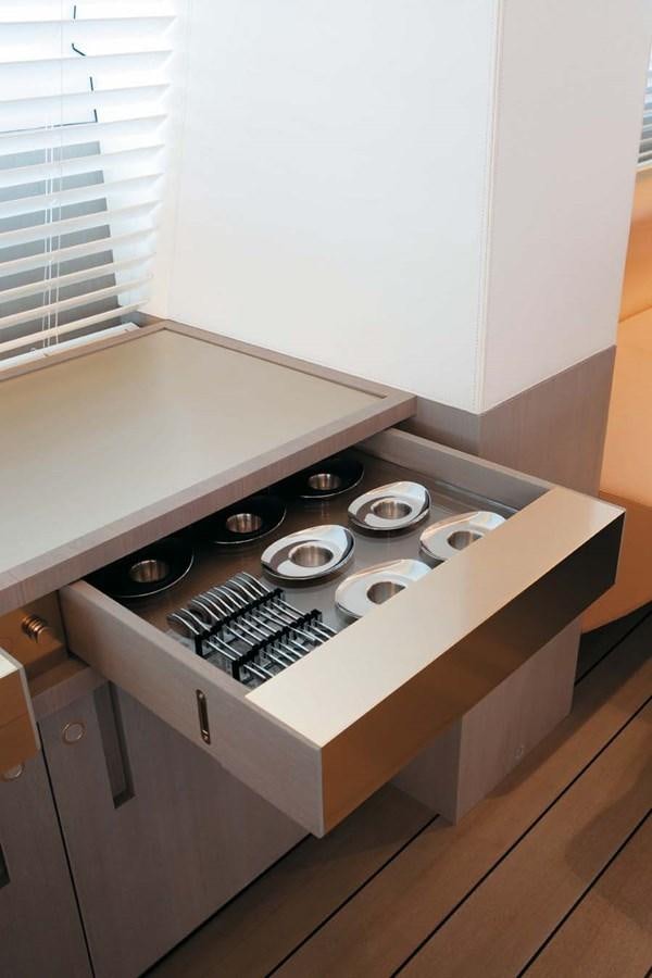 a counter top with a lot of silver coins on it aboard ENTERPRISE Yacht for Sale
