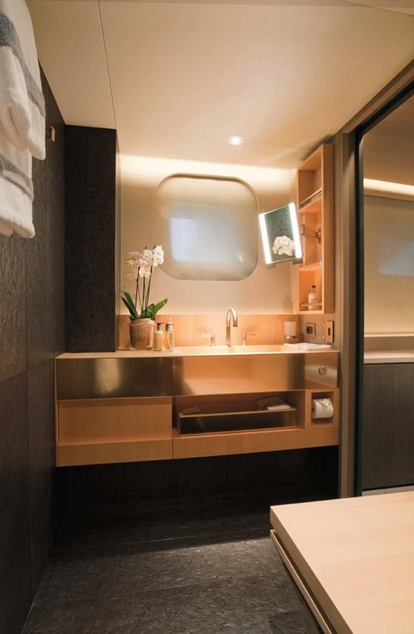a bathroom with a sink and a mirror aboard ENTERPRISE Yacht for Sale