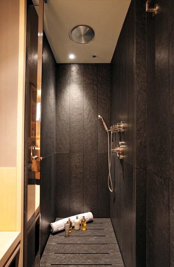 a bathroom with a shower aboard ENTERPRISE Yacht for Sale