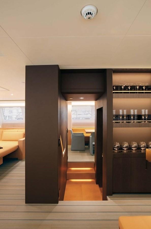 a room with a glass wall and a door with a glass door aboard ENTERPRISE Yacht for Sale