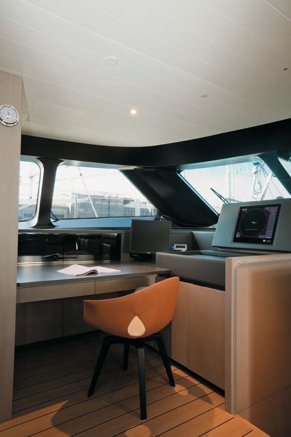 a room with a desk and a chair aboard ENTERPRISE Yacht for Sale